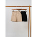 Elastic double-button shorts