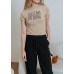 Full-shouldered, high-necked, lettered crop top