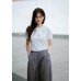A solid color top with a double bow