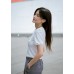 A solid color top with a double bow
