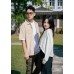 Asymmetrical solid color top