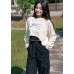 Asymmetrical solid color top