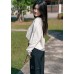 Asymmetrical solid color top