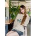 Long-sleeved shirt with a letter reverse collar