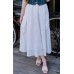 Rubber maxi skirt with double side pockets