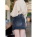 High-waisted black denim skirt