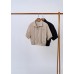 Zip-up jacket with plastic hem of the top