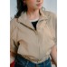 Zip-up jacket with plastic hem of the top